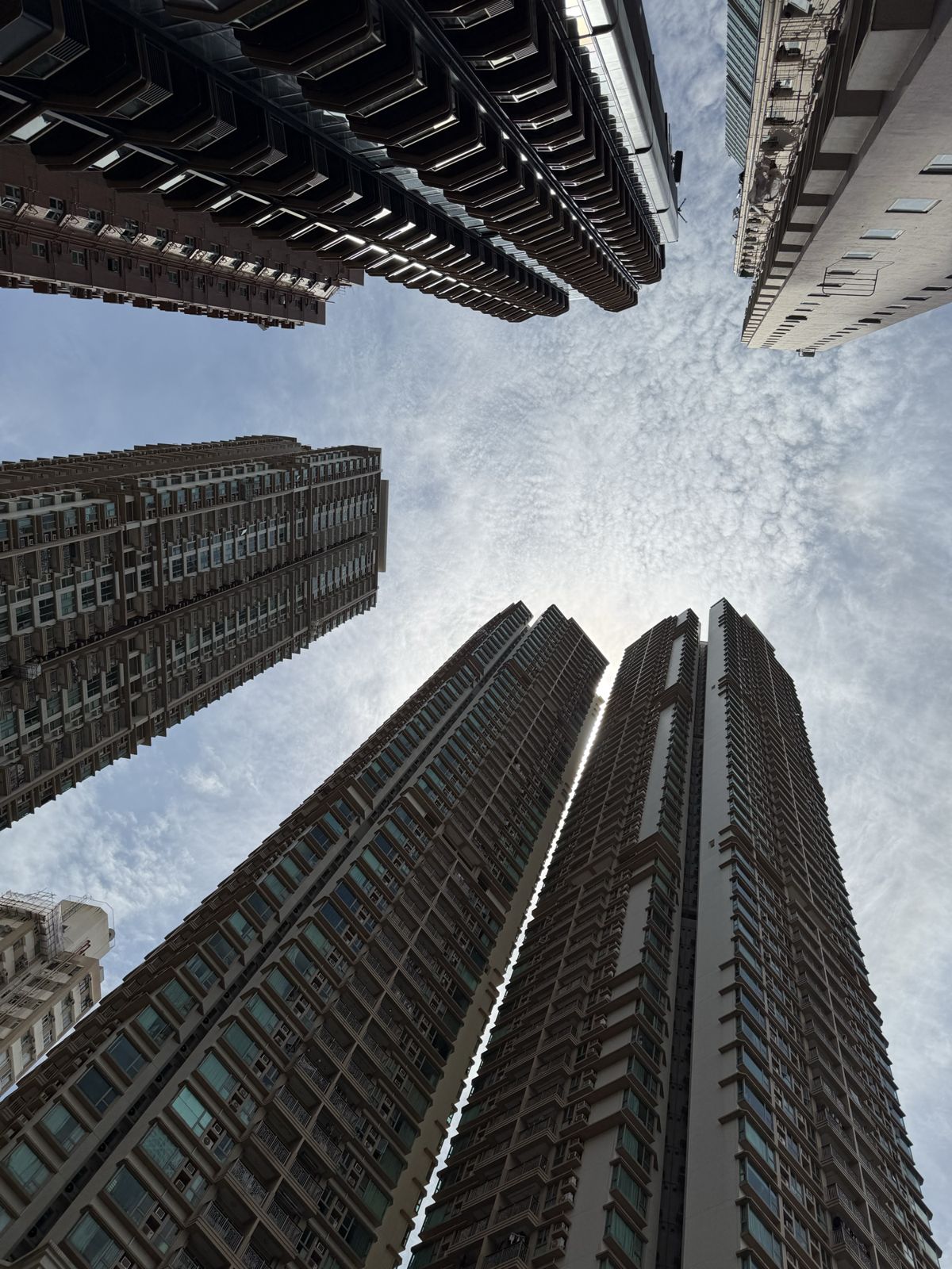Looking straight up at residential high-rises